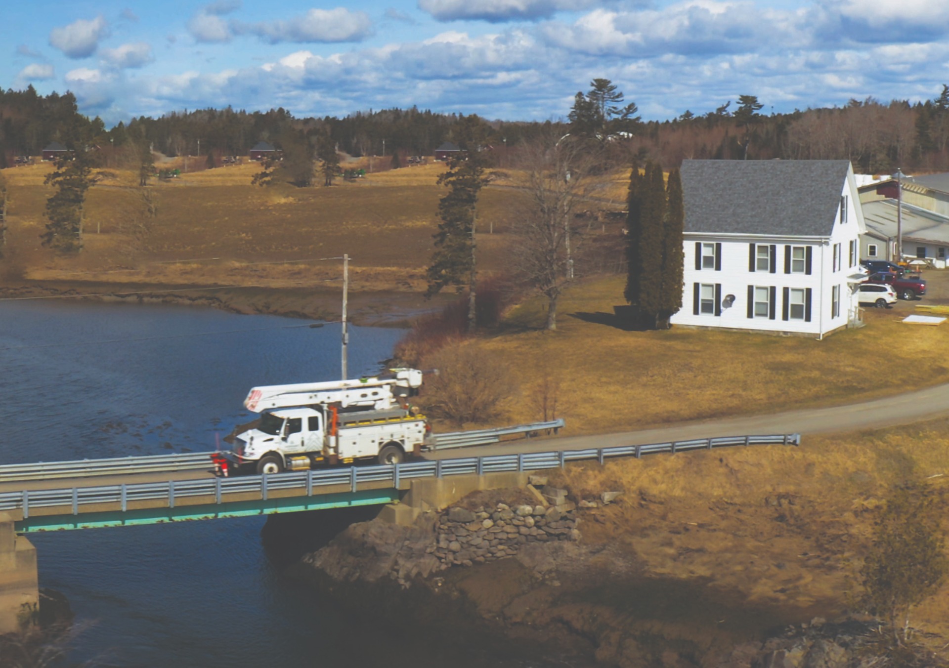 Truck driving through farm